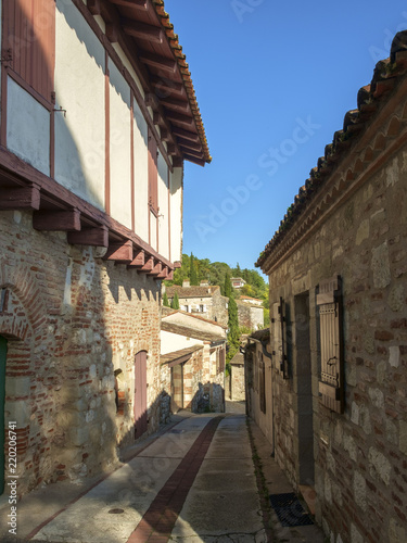 There is much traditional architecture to be seen lining the narrow streets of travel destination Penne d'Agenais, Lot et Garonne, France.  © Chris Rose