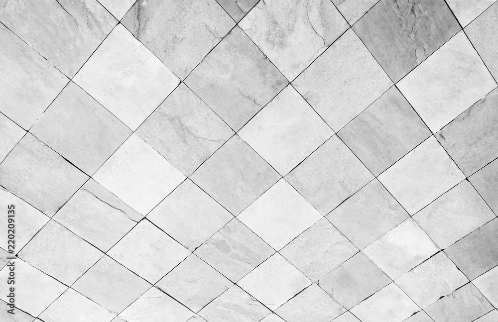 Stone block walk path in the park, The area is made of white and gray rock blocks for pedestrian walkways. Stone block walk path in the park, The area is made of white and gray rock blocks for pedestrian walkways.