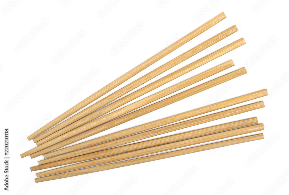 Asian wooden chopsticks isolated on white background, top view Asian wooden chopsticks isolated on white background, top view