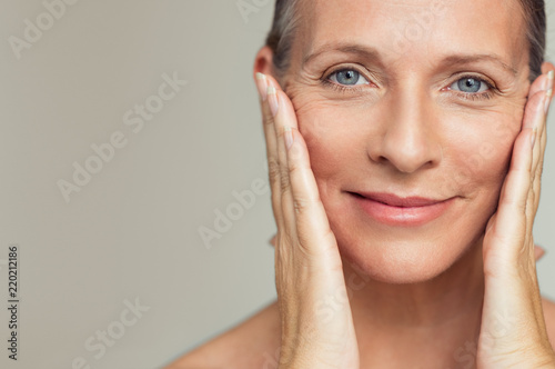 Happy mature woman aging process photo