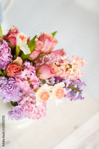 Bouquet of flowers: lilac, daffodil, tulip, peony, rose