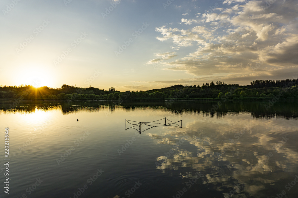 Fototapeta premium Tramonto sul lago olimpico