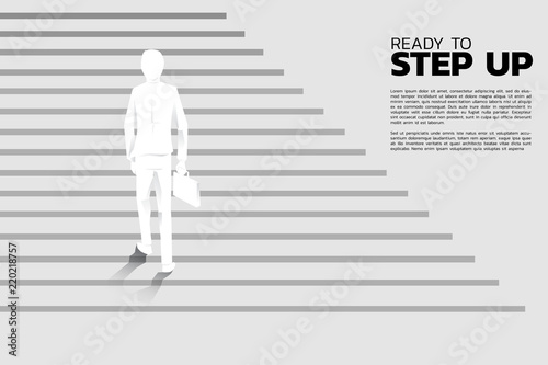 Silhouette of businessman with briefcase step up on stair. Concept of people ready to up level of career and business.