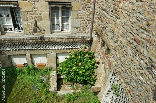 The patio in the old town, Mont Saint Mishel, Normandy, France photo