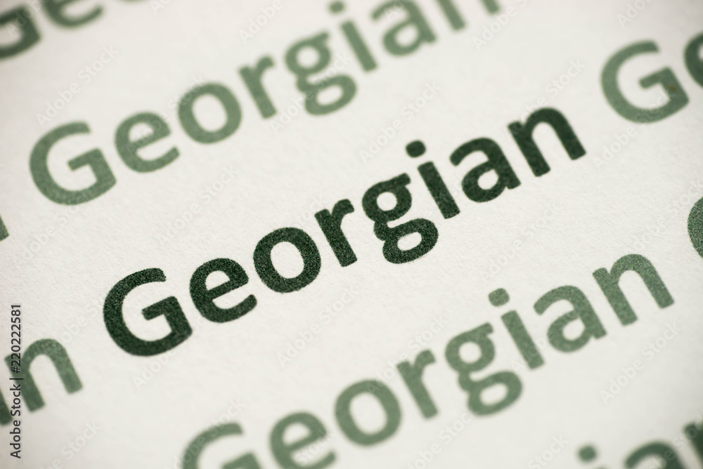 Fototapeta premium word Georgian language printed on paper macro