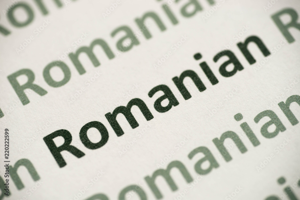 Fototapeta premium word Romanish language printed on paper macro