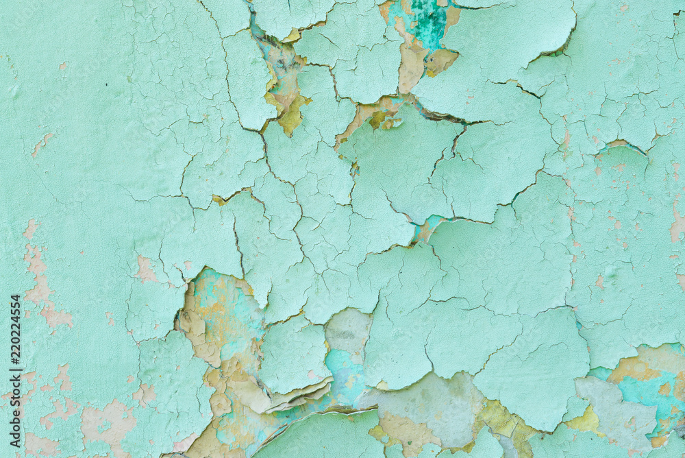 Obraz premium Close-up detail of cracked paint on wall.