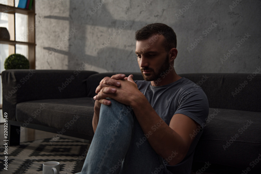 lonely depressed man sitting at home lonely depressed man sitting at home