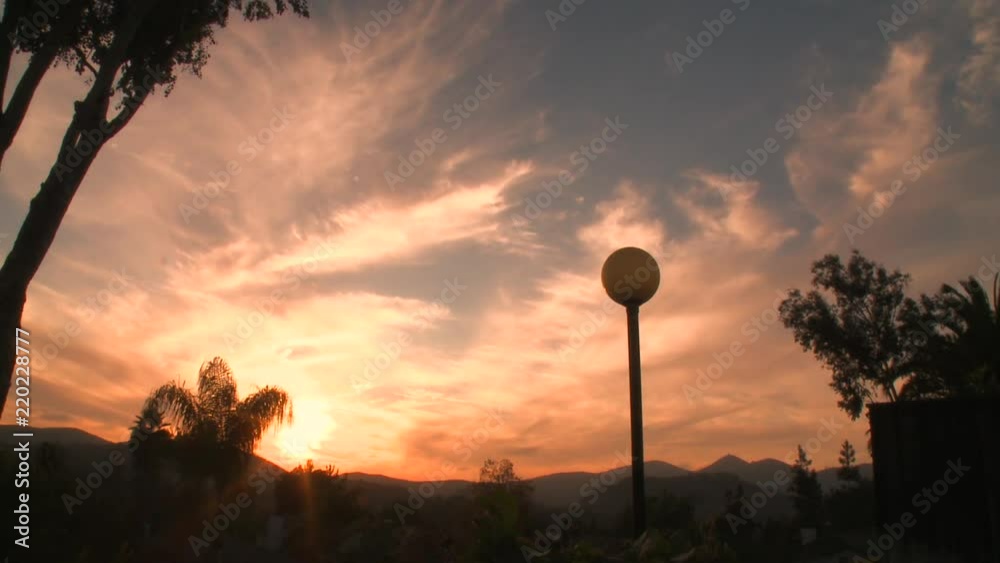 Time-Lapse: Clouds Move Through Sky While Sun Sets Time-Lapse: Clouds Move Through Sky While Sun Sets