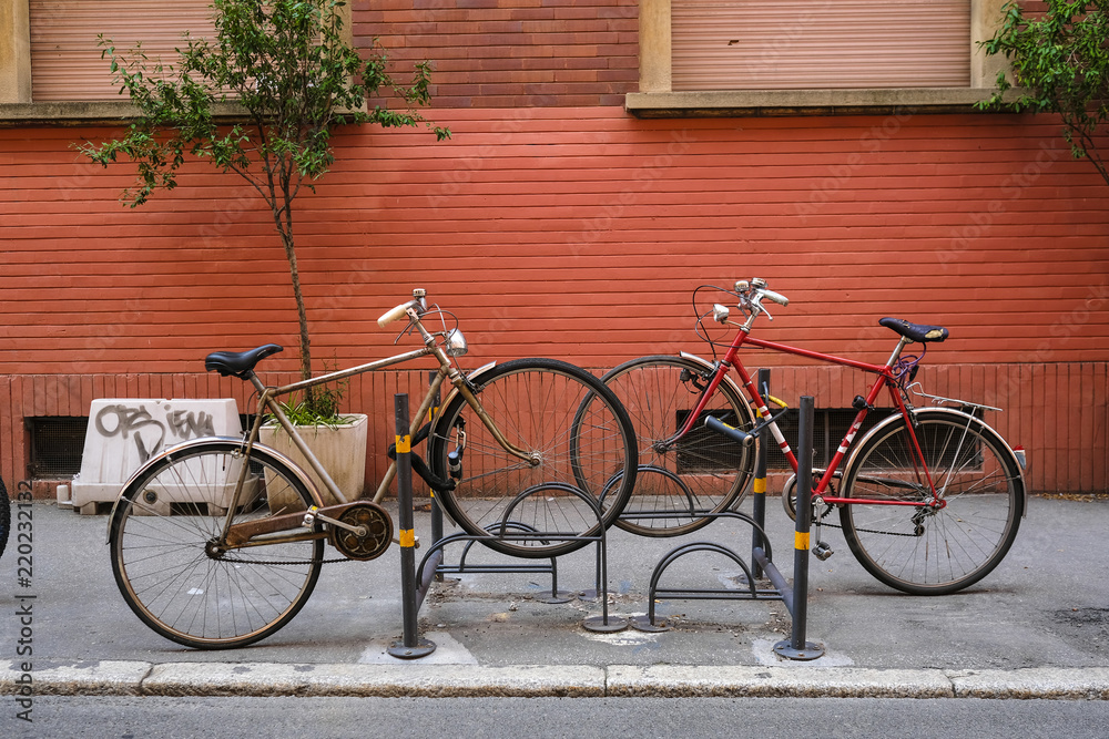 Bologna, Italy - July, 30, 2018: bicycles on a parking in a center of Bologna