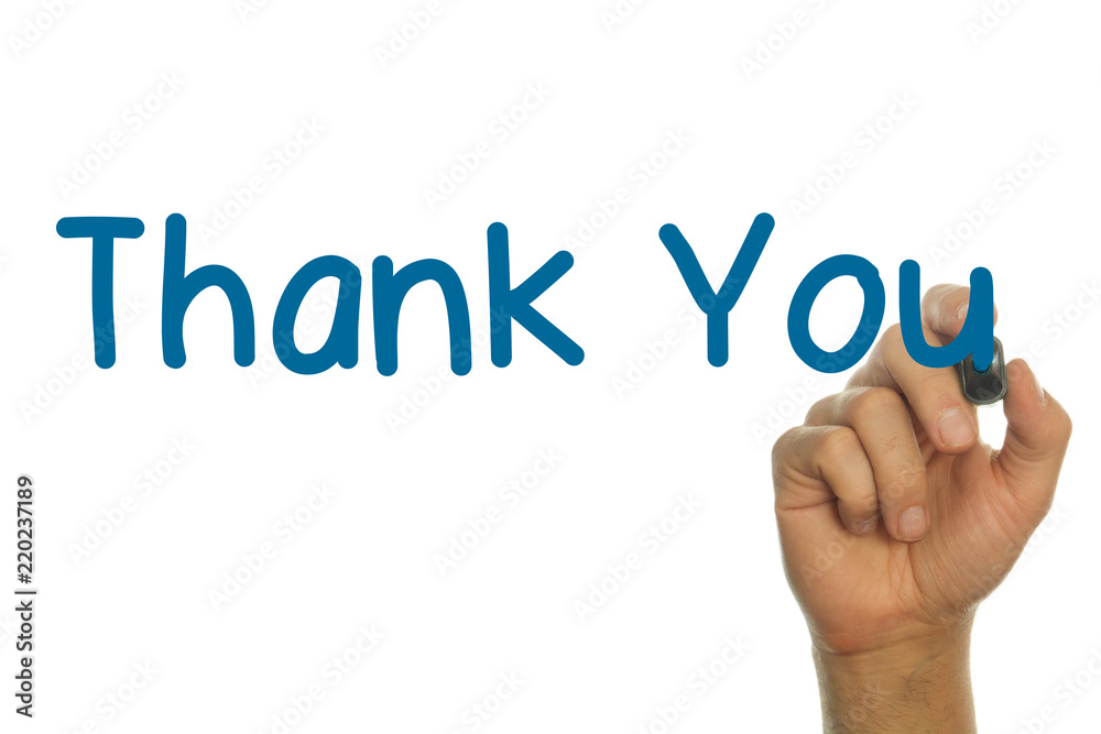 hand writing the word Thank You in blue handwritten letters hand writing the word Thank You in blue handwritten letters
