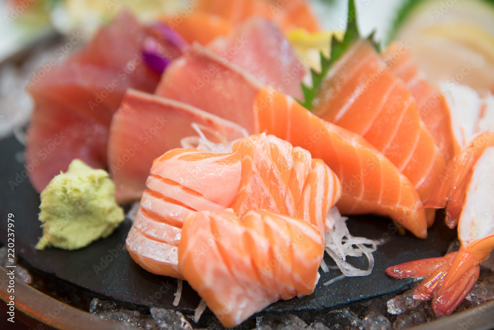 sashimi set with different fresh fish sliced on plate sashimi set with different fresh fish sliced on plate