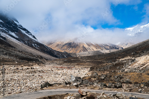 Mist and cloud cover mountain peak Landscape view at ZERO POINT, blue sky day time, Sikkim,India