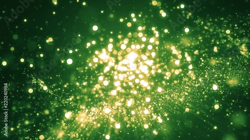 Green light shine particles bokeh, holiday concept. Christmas animated gold background with circles and stars. Space background. Screen green. Seamless loop.
