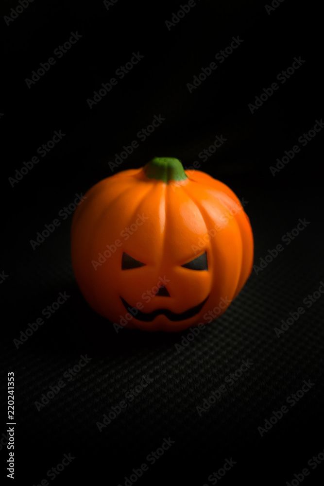 The halloween pumpkin jack in black holiday background image. The halloween pumpkin jack in black holiday background image.