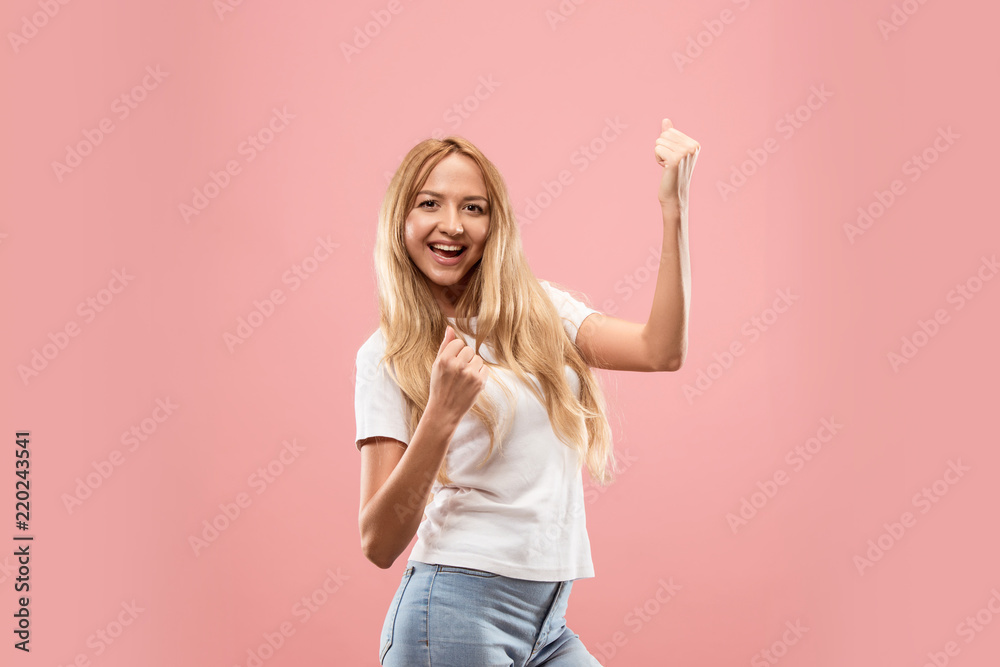 I won. Winning success happy woman celebrating being a winner. Dynamic image of caucasian female model on studio background. Victory, delight concept. Human facial emotions concept. Trendy colors I won. Winning success happy woman celebrating being a winner. Dynamic image of caucasian female model on studio background. Victory, delight concept. Human facial emotions concept. Trendy colors