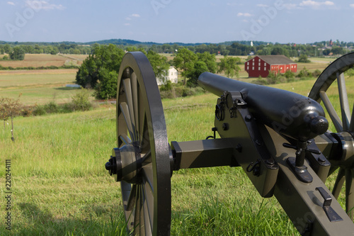 Tablou pe pânză Cannon overlooking a farm at Gettysburg PA