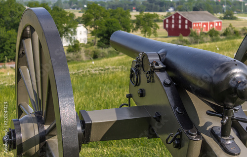 Cannon overlooking a farm at Gettysburg PA photo