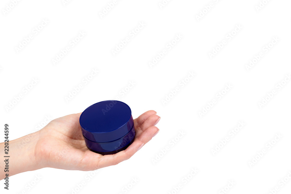 Clean cream bottle with hand isolated on white background, copy space template Clean cream bottle with hand isolated on white background, copy space template