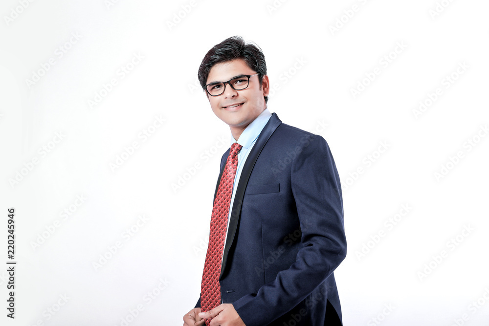 Young Indian businessman over white background Young Indian businessman over white background