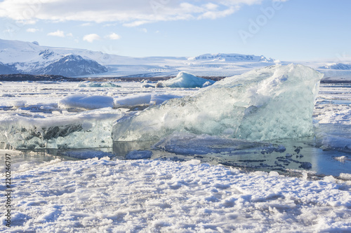 Beautiful cold winter landscape with icebergs in Jökulsárlón glacial lagoon, Vatnajökull National Park, southeast of Iceland, Europe.