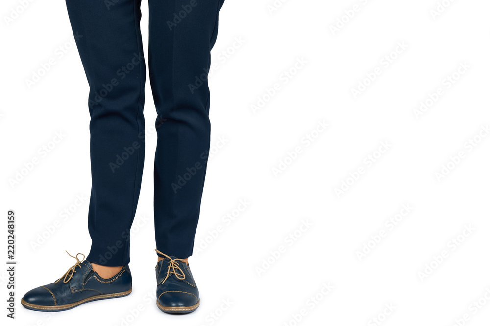 Female leg in pants and leather shoes isolated on white background, copy space template Female leg in pants and leather shoes isolated on white background, copy space template