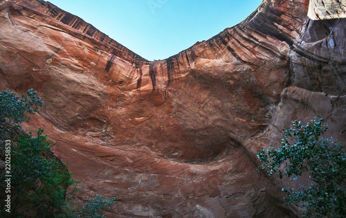 Towering Canyon Walls in Escalante National Monument backpacking through Coyote Gulch
