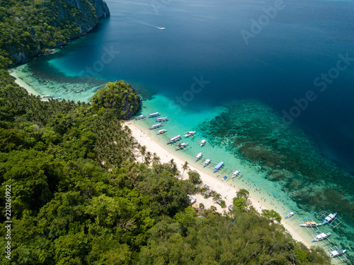 Aerial drone view of a beautiful, sandy tropical beach in Palawan, Philippines