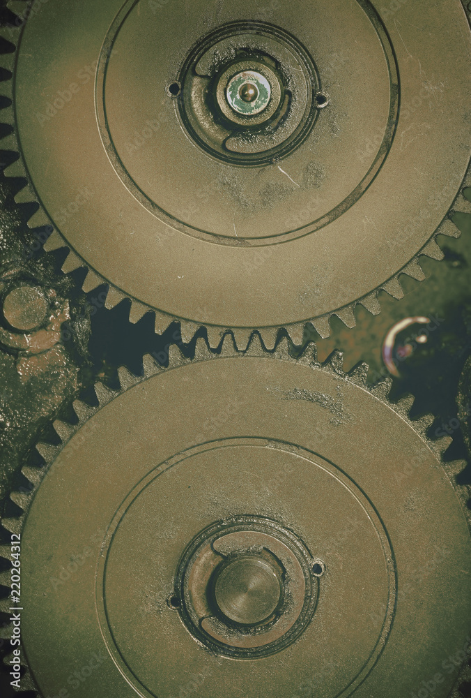 Gears in a hitch abstract background conceptual image reflecting the essence of the relationship