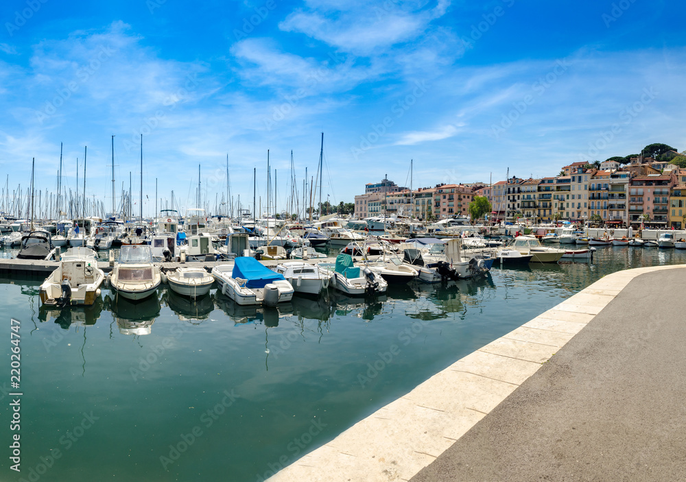 Panoramic view of bright colorful boats in the port of Nice, Cote d’Azur, French Riviera, France