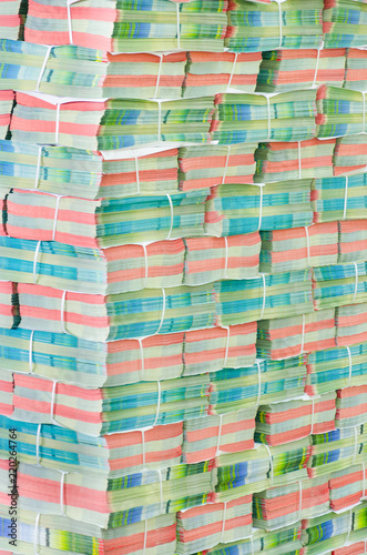 stack of flyers on white background photo
