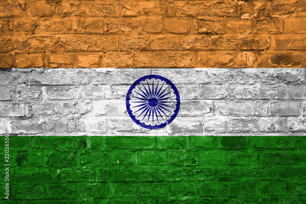 Flag of India over an old brick wall background, surface