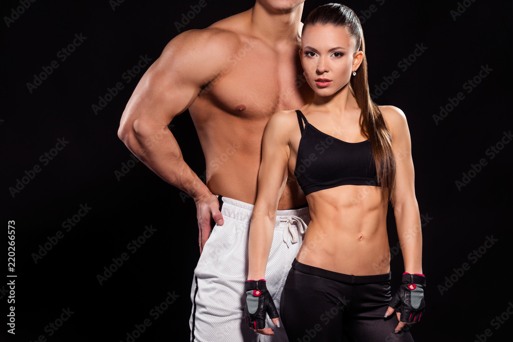 Fototapeta premium Young fit woman and bodybuilder.