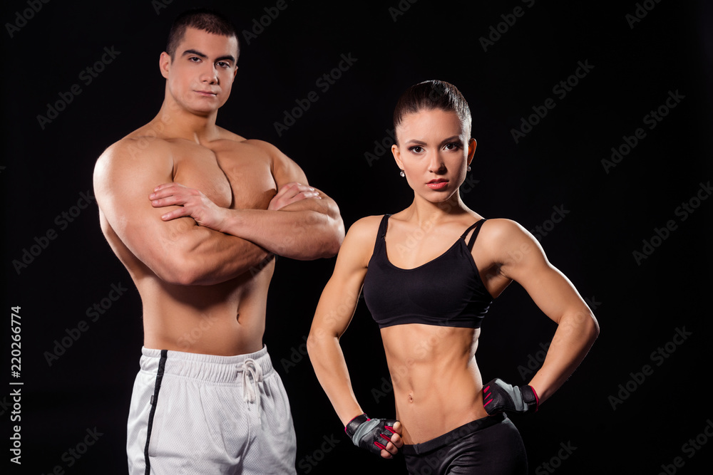 Fototapeta premium Strong athlete and lean woman. 