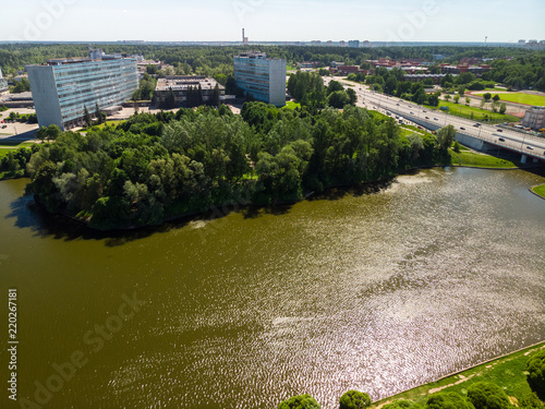 Bridge, large city pond and Victory Park in Zelenograd Russia. photo