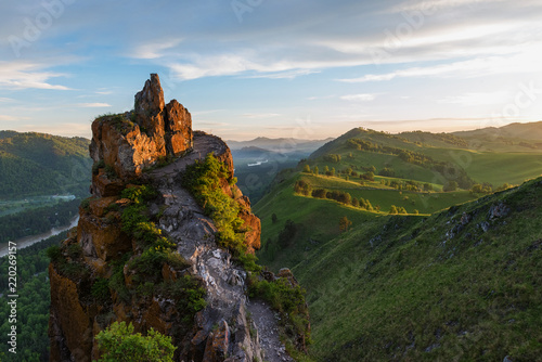 Beauty dawn on the peak, in the mountains in Altay