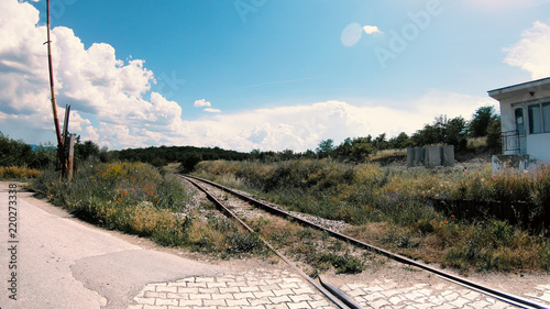 Fotografie Pov of Car Driver Cross The Tracks At Railway Level Crossing