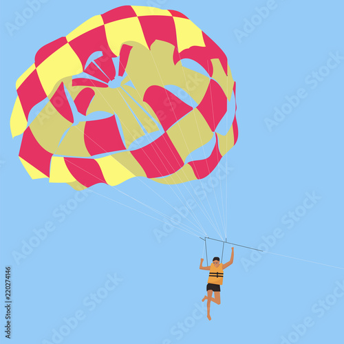 Skydiver on a blue sky background