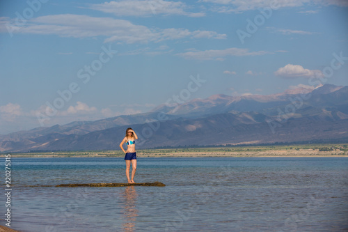 girl in a swimsuit on a mountain lake © Alexandr Vlassyuk
