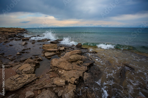 Wallpaper Mural Stone in the water, Mountain lake, Issyk-Kul, Kyrgyzstan Torontodigital.ca