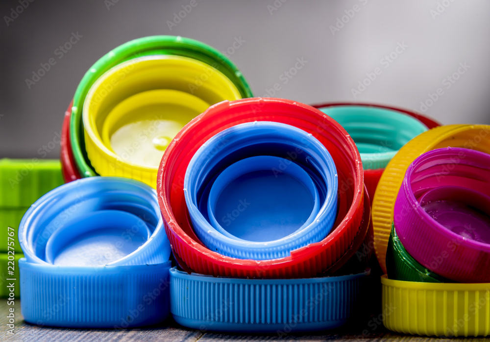 Composition with colorful plastic bottle caps Composition with colorful plastic bottle caps