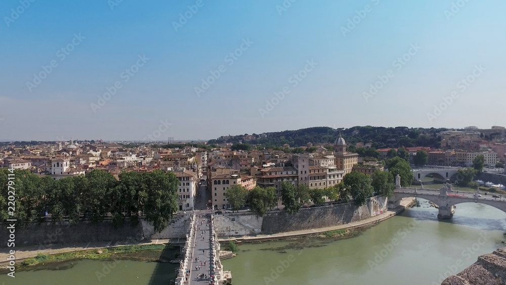 Aerial view on Tiber river with bridges St. Angelo and Vittorio Emanuele II in Rome, Italy