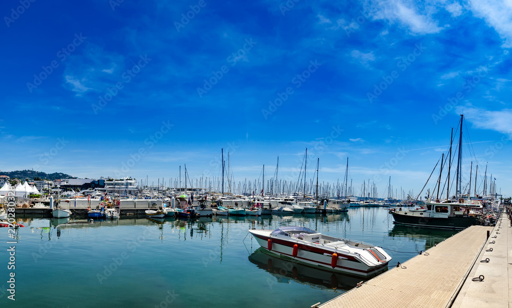 Beautiful white modern yachts at sea port in Nice, France, Europe Beautiful white modern yachts at sea port in Nice, France, Europe