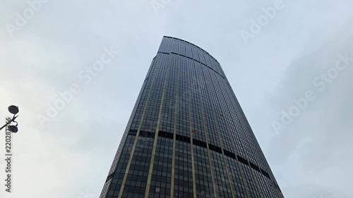Tour Montparnasse skyscraper, Paris, France, cinematic steadycam move under the building