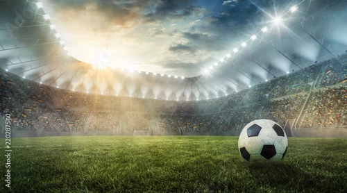 Obraz Piłka jest na stadionie piłkarskim na trawie