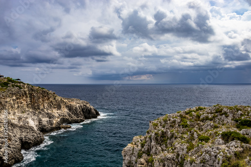 sea ​​on a rainy day at the bridge of Ciolo