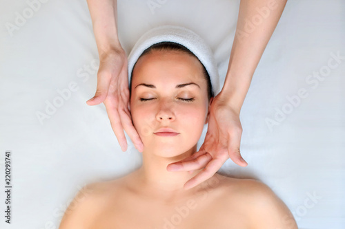 Spa procedure of face massage.