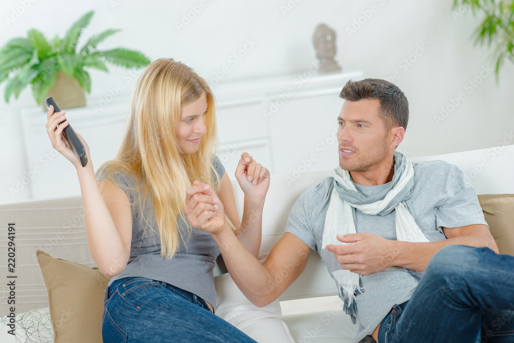 Fototapeta premium couple with remote control