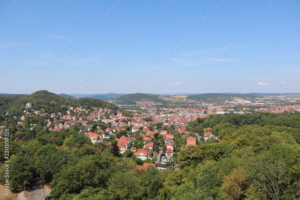 Obraz premium View to Eisenach from the Göpelskuppe on the edge of the Thuringian Forest, Germany
