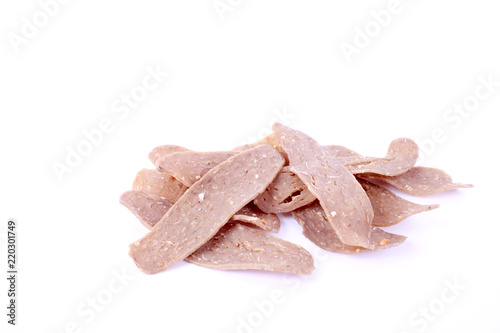 Home made raw fish cracker on white background. photo